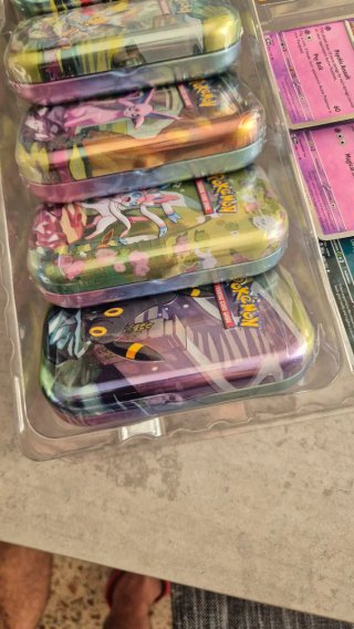 Pack 8 Mini Tins Prismativ Evolutions Inglés