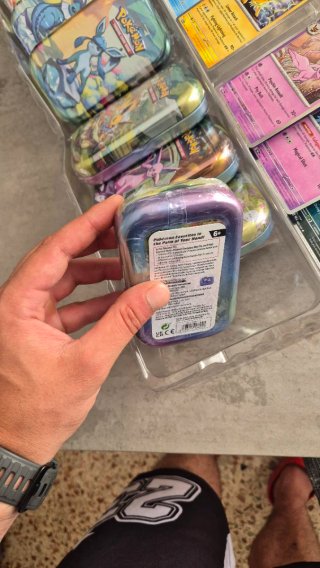 Pack 8 Mini Tins Prismativ Evolutions Inglés