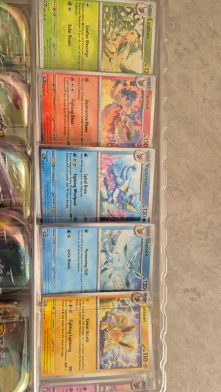 Pack 8 Mini Tins Prismativ Evolutions Inglés