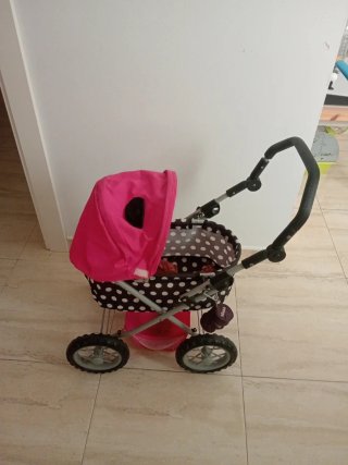 Carrito de muñecas plegable rosa y lunares