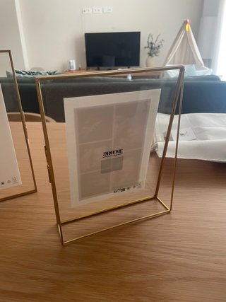 Marcos de fotos Zara Home dorados