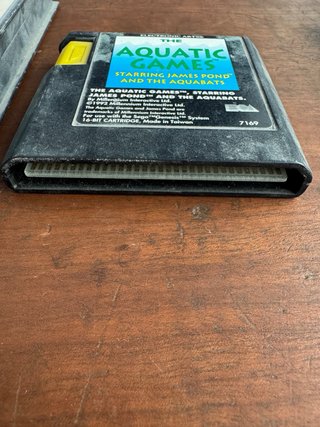 Cajas Sega Mega Drive y juego Aquatic Games