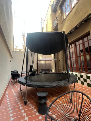 Cama elástica redonda con red protectora