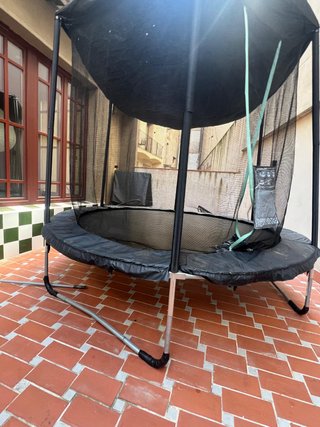 Cama elástica redonda con red protectora