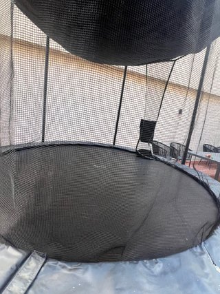 Cama elástica redonda con red protectora