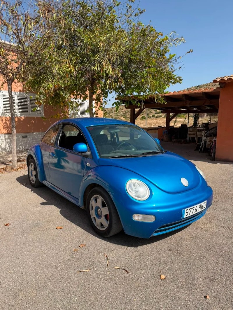 Volkswagen New Beetle 2000 - foto 1