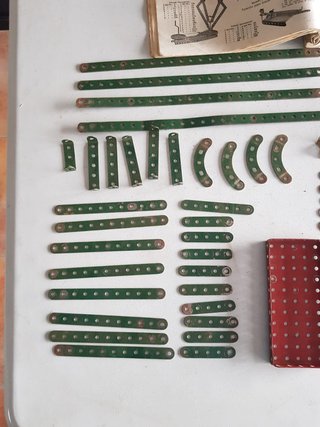 Lote piezas Meccano y catálogo vintage