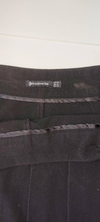 Falda negra pantalón plisada