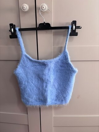 Top peludo azul