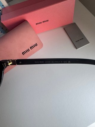 Gafas de sol Miu Miu negras y rosas