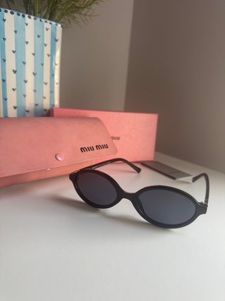 Gafas de sol Miu Miu negras y rosas