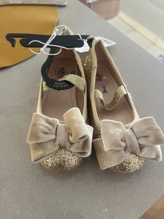 Zapatos H&M Niña Dorados con Lazo