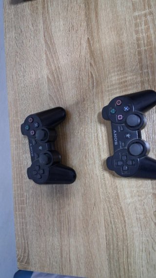 Consola PS3 con 2 mandos