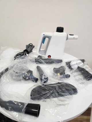 Vaporeta de mano eléctrica con accesorios