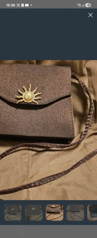 Bolso marrón con sol dorado y perla new