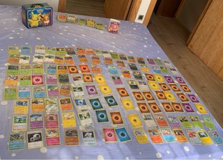 Caja metálica Pokémon + 350 cartas