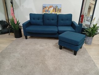 Sofá azul con otomana