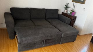 Sofa de tres piezas extensible y con almacenaje.