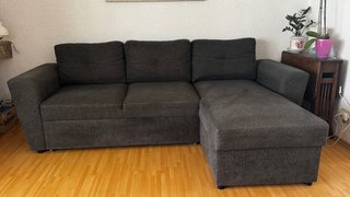 Sofa de tres piezas extensible y con almacenaje.