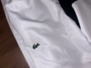 Conjunto deportivo Lacoste blanco y negro