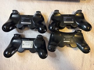 Consola PS3 Super Slim + 4 mandos y juegos