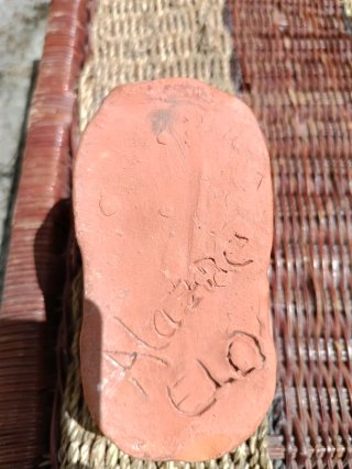 Cesta de barro firmada