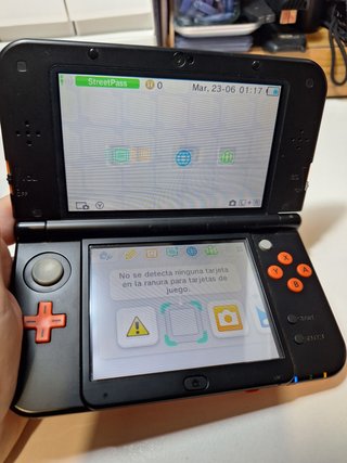New Nintendo 3DS XL naranja con caja y manual