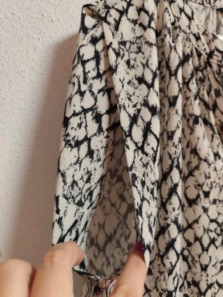 Camisa larga y oversize de chica talla S de H&M.