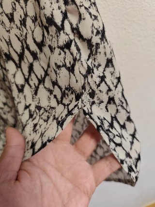 Camisa larga y oversize de chica talla S de H&M.