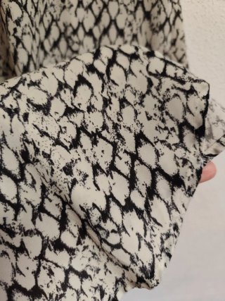 Camisa larga y oversize de chica talla S de H&M.