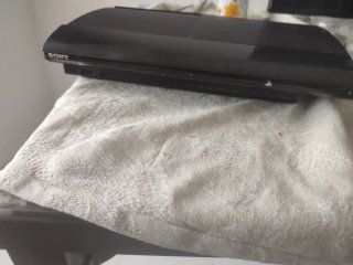 PS3 Super Slim 500GB Negra + Juegos