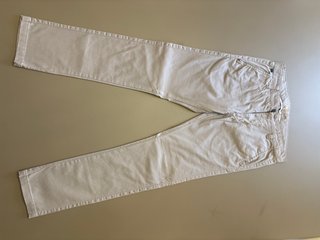 Pantaloni eleganti beige mai indossati