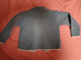 Chaqueta bebé azul con detalles blancos