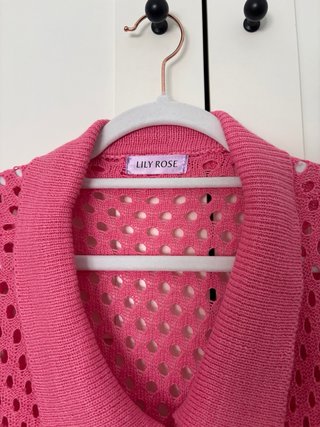 Cárdigan rosa de punto calado