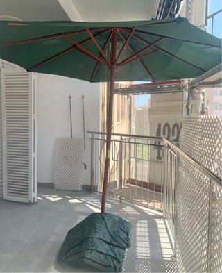 Mesa de madera extensible para exterior