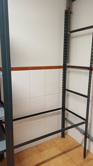 Triple estantería metálica