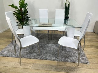 Mesa cristal 6 sillas blancas