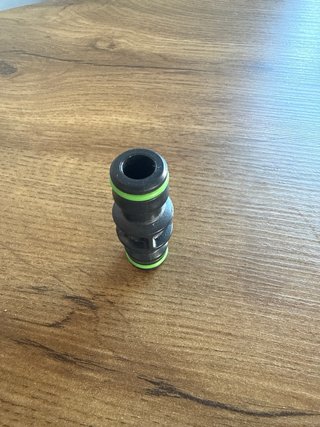 Conector doble macho para manguera