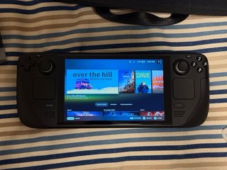 Steam Deck LCD 64GB + Tarjeta 512GB + Dock + funda