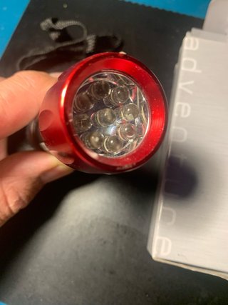 Linterna LED Orizons Roja y Plateada