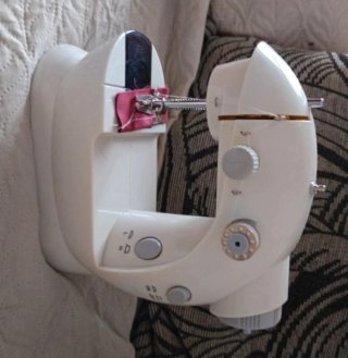 Máquina de coser Genius con doble hilo