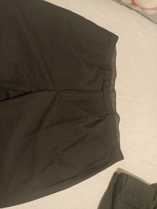 Quattro pantaloni da cerimonia da uomo neri