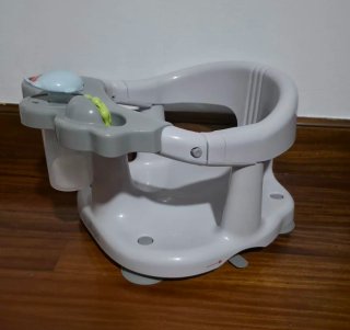 Asiento bañera bebé con juguetes