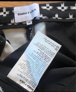Calças Bimba y Lola pretas com padrão branco