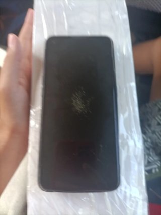 Oppo A74 128GB 6GB RAM y una funda. Pantalla rota