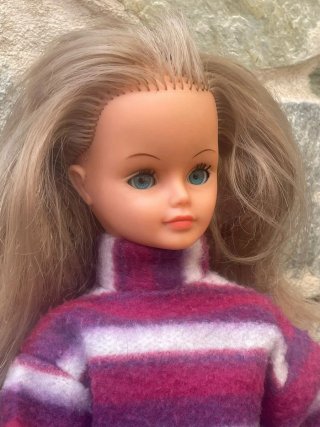 Muñeca Bella Cathie pelo rubio ojos azules