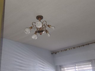 Lámpara de techo de araña dorada y transparente