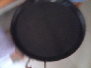 Paellero y paella negra