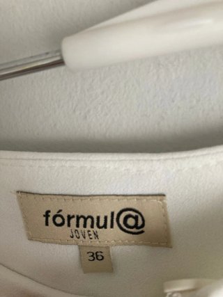 Elegantes pantalones blancos Fórmula Joven