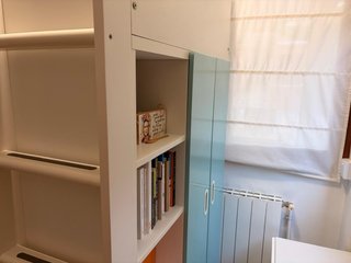 Habitación juvenil cama alta